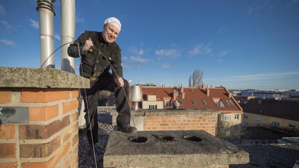 Rauchfangkehrer am Daach