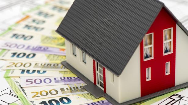 model home with lot of Euro banknotes bundles