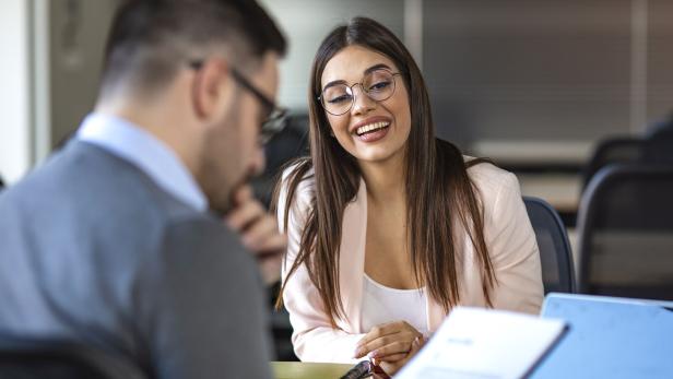 Young attractive woman during job interview